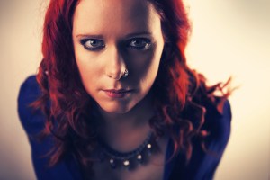 With a cool necklace.